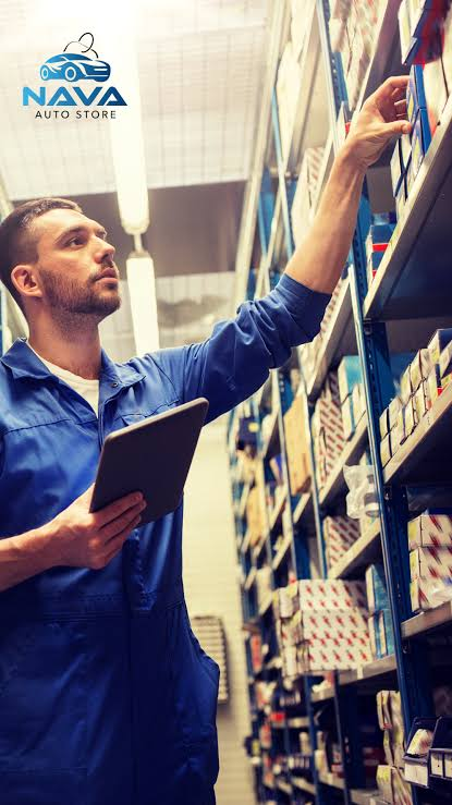 Automotive parts specialist working in a warehouse